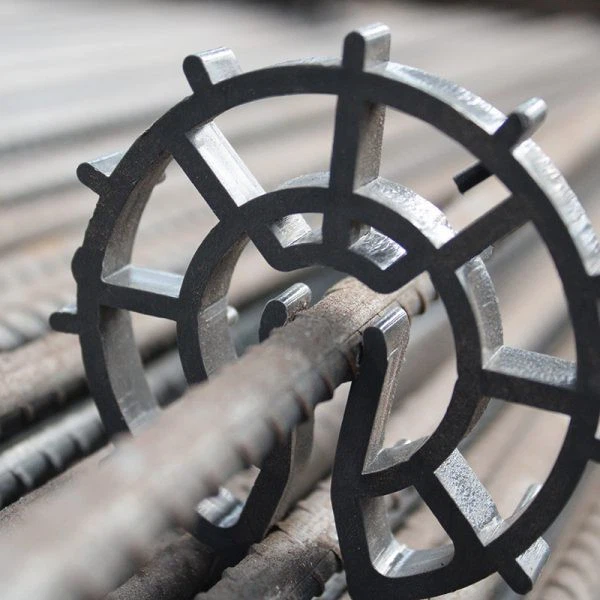 Kodėl plastikiniai armatūros fiksatoriai yra būtini: „nematomas“ kokybės garantas